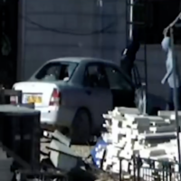 Assailants smash Mahmoud Dramin's car in the South Hebron Hills on October 27, 2025. (Screen capture: X/masafering)